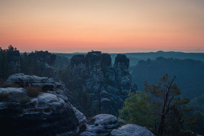 Scenic view of landscape at sunset