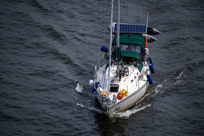 High angle view of ship sailing on sea