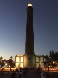 Low angle view of monument against clear sky at night
