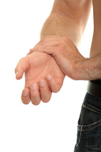Close-up of hands against white background