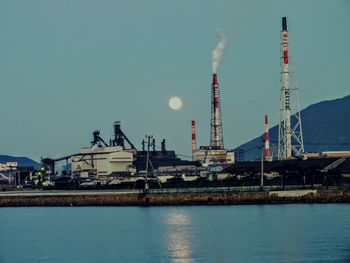 Commercial dock against sky