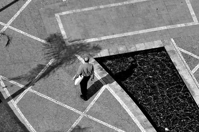 Woman walking on road