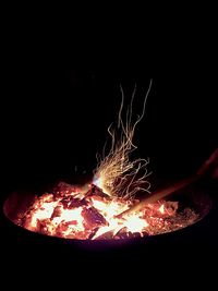 Close-up of fire in the dark