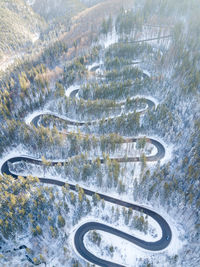 Aerial view of snow covered mountain road