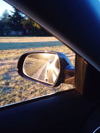 Close-up of car side-view mirror