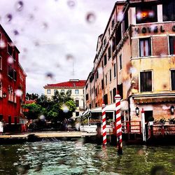 View of canal in city