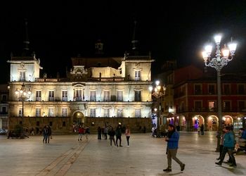 Group of people in city at night