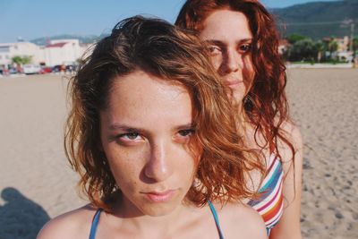 Portrait of smiling young woman on beach