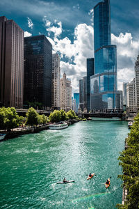 Buildings in city against sky