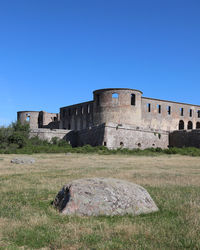Old ruins against clear blue sky