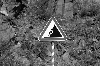 Landslide sign against rock formation
