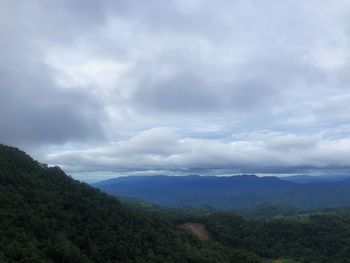 Scenic view of landscape and mountains against sky