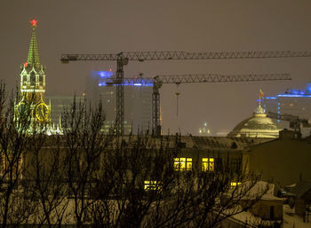 Illuminated buildings in city at night