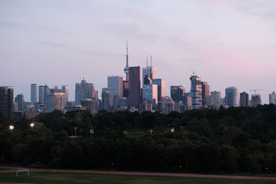 Modern buildings in city against sky