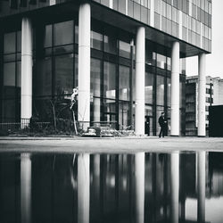 Reflection of building on glass window