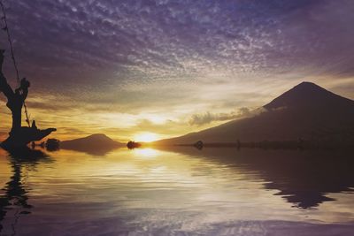 Scenic view of sunset over sea