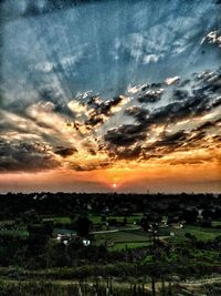 Scenic view of landscape against sky during sunset