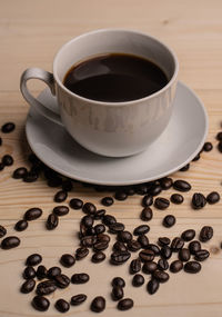 High angle view of coffee cup on table