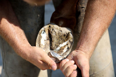 Close-up of man holding ice cream