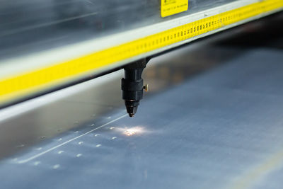 Laser cutting of plastic. production of personal protective equipment, organized by volunteers in by