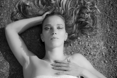 High angle portrait of woman lying down