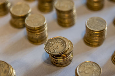 High angle view of coins on table