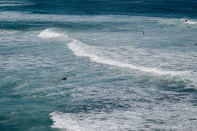 High angle view of people on sea