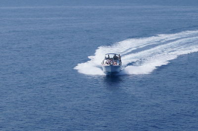 Boat sailing in sea