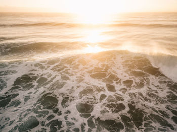 Scenic view of beach during sunset