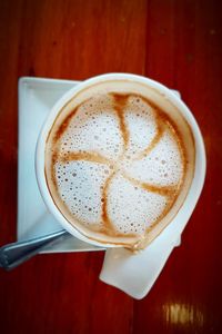 Directly above shot of coffee cup on table