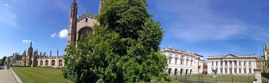 Panoramic view of historic building against blue sky