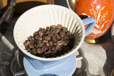 High angle view of coffee beans on table