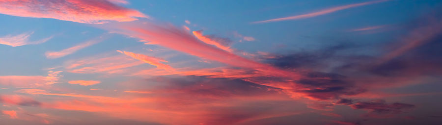 Low angle view of dramatic sky during sunset