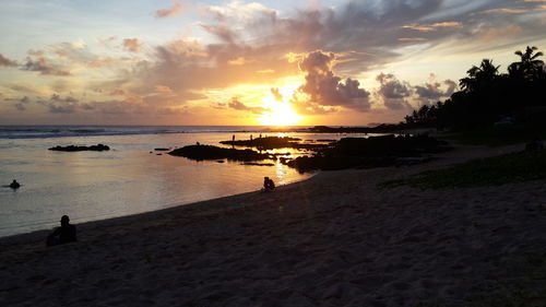 Scenic view of sea at sunset