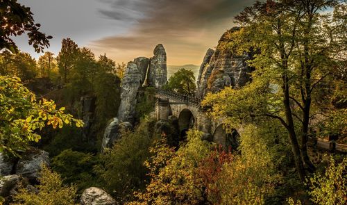 View of arch bridge against sky during sunset