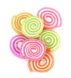 High angle view of multi colored candies against white background