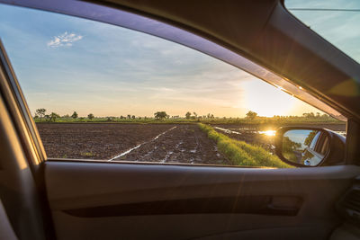 View of sky through car window