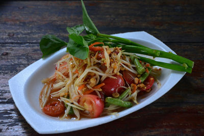 Close-up of salad in plate on table