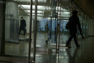 People walking in corridor