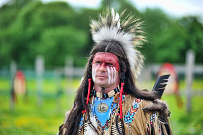 Portrait of man standing outdoors