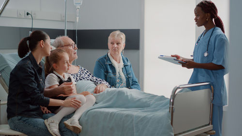 Doctor examining patient at clinic