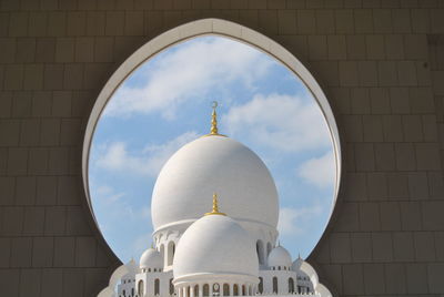 View of grand mosque from arch window