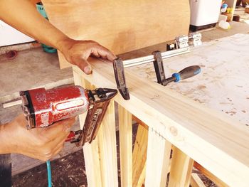 Man working on wood