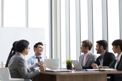 Friends sitting on table
