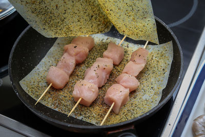 High angle view of meat in cooking pan