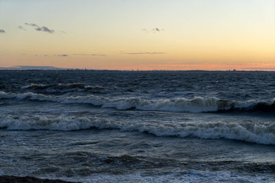 Scenic view of sea against sky during sunset