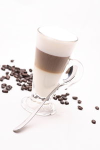 Close-up of coffee cup against white background