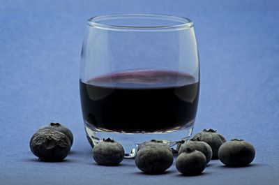 Close-up of drink against white background