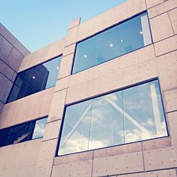 Low angle view of modern building against clear sky