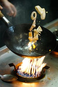 Close-up of burning candles on barbecue grill